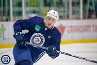 Андрей Чибисов набирает очки в АХЛ
